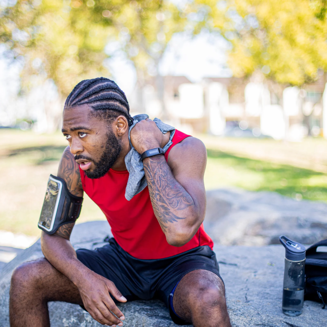 A man who is sweating after a workout.