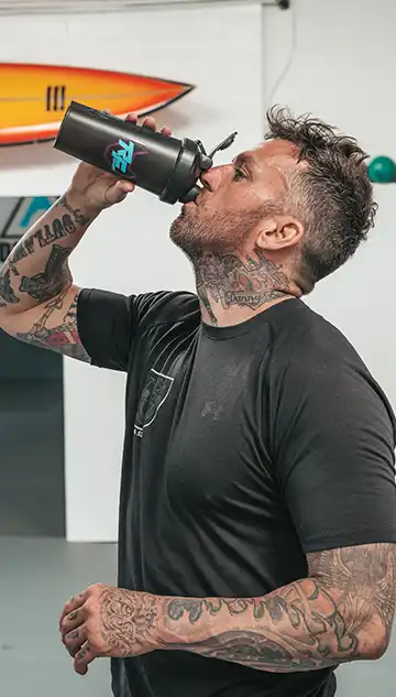 Athlete recovering with RF Supplements clean recovery formula